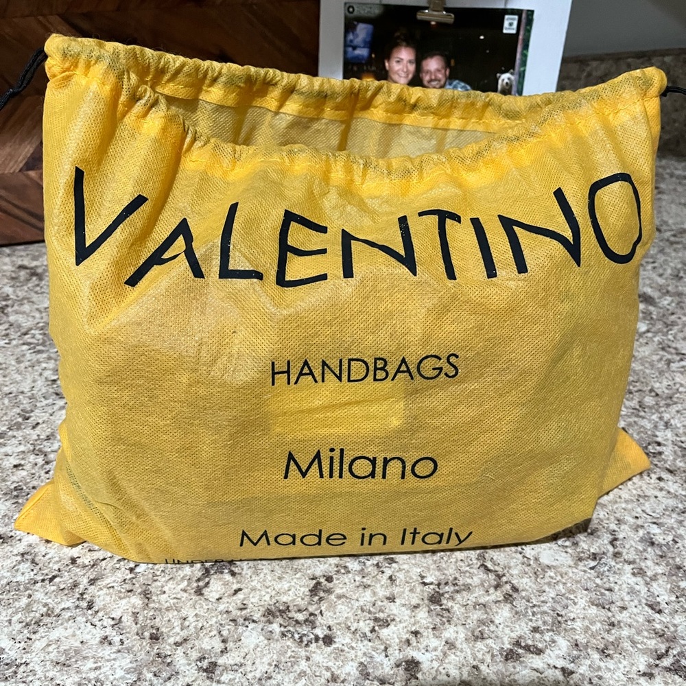 Valentino handbag comes with tags and dustbag, GREAT CONDITION NEVER USED